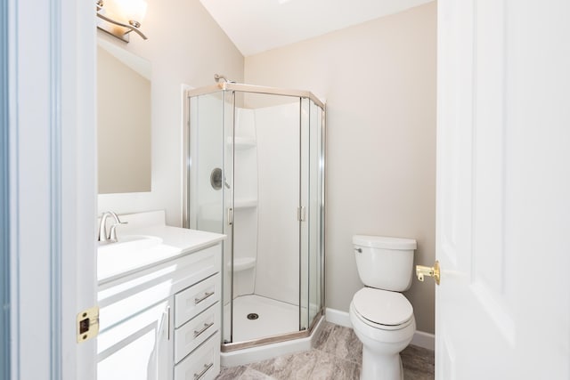 1196 Rathfon Cir, Saline, MI 48176 - bathroom with toilet, a stall shower, vanity, and baseboards