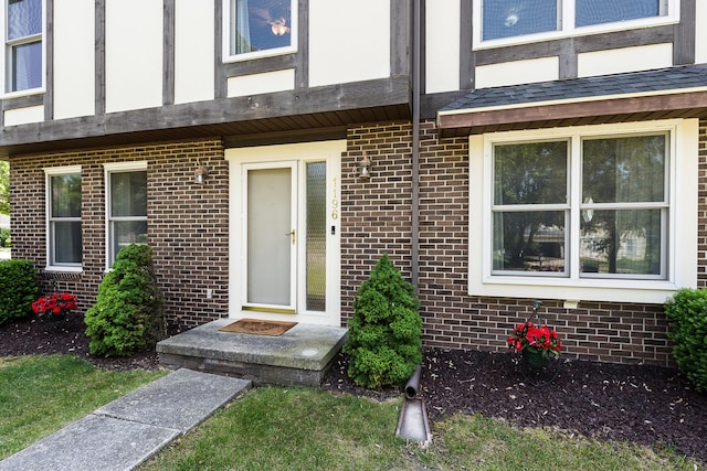1196 Rathfon Cir, Saline, MI 48176 - property entrance featuring brick siding