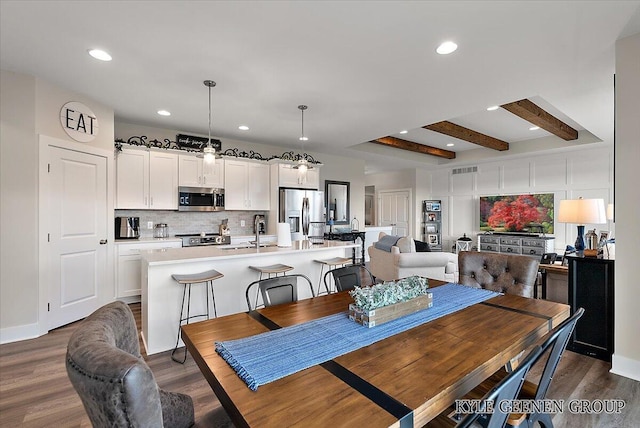 4745 W Lake Dr, Holland, MI 49423 - dining area with dark wood-style flooring and recessed lighting
