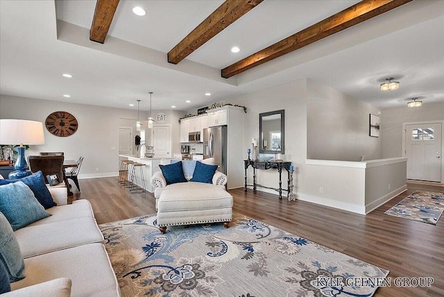 4745 W Lake Dr, Holland, MI 49423 - living room featuring recessed lighting, dark wood finished floors, baseboards, and beam ceiling