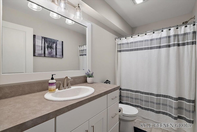 4745 W Lake Dr, Holland, MI 49423 - bathroom featuring vanity and toilet