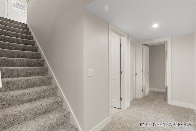 4745 W Lake Dr, Holland, MI 49423 - stairs featuring baseboards, carpet floors, and recessed lighting
