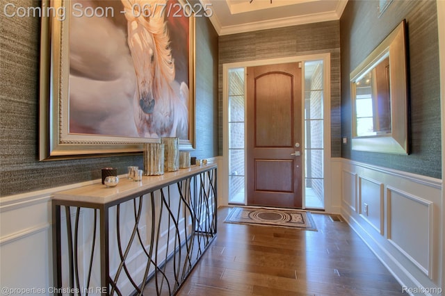 49062 Honey Tree Ct, Northville, MI 48168 - entrance foyer featuring ornamental molding, dark wood-type flooring, a wainscoted wall, and a decorative wall