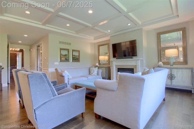49062 Honey Tree Ct, Northville, MI 48168 - living room with coffered ceiling, dark wood-type flooring, a glass covered fireplace, beamed ceiling, and a wainscoted wall
