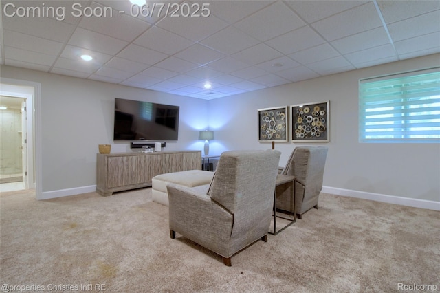 49062 Honey Tree Ct, Northville, MI 48168 - carpeted living room featuring a paneled ceiling and baseboards
