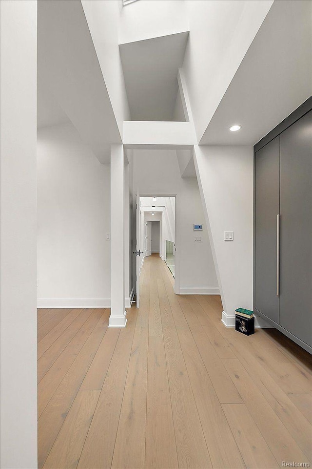 647 Ann St, Birmingham, MI 48009 - corridor featuring baseboards, light wood-style flooring, and recessed lighting