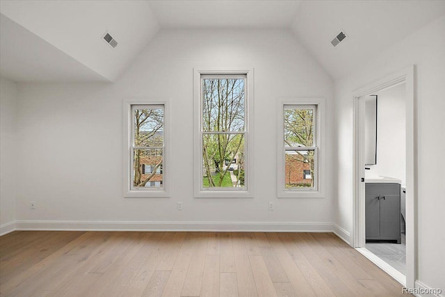 647 Ann St, Birmingham, MI 48009 - bonus room featuring light wood-style floors, vaulted ceiling, and baseboards