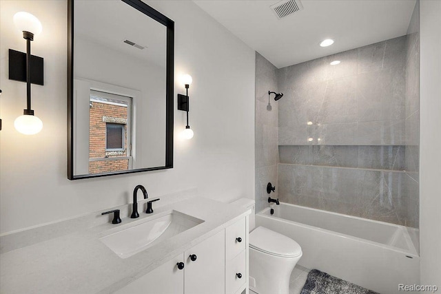 647 Ann St, Birmingham, MI 48009 - bathroom featuring vanity, toilet, and shower / tub combination