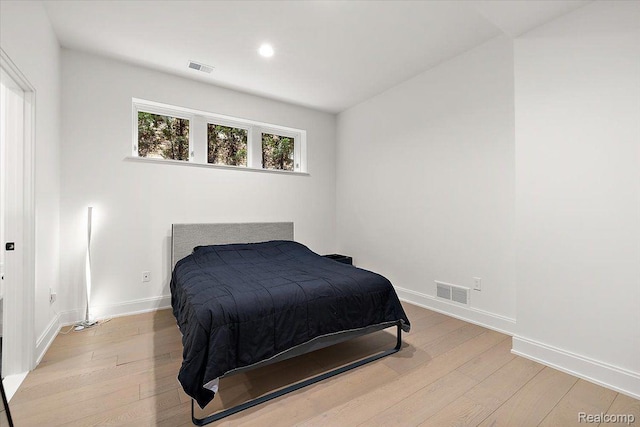 647 Ann St, Birmingham, MI 48009 - bedroom with light wood-type flooring, baseboards, and recessed lighting