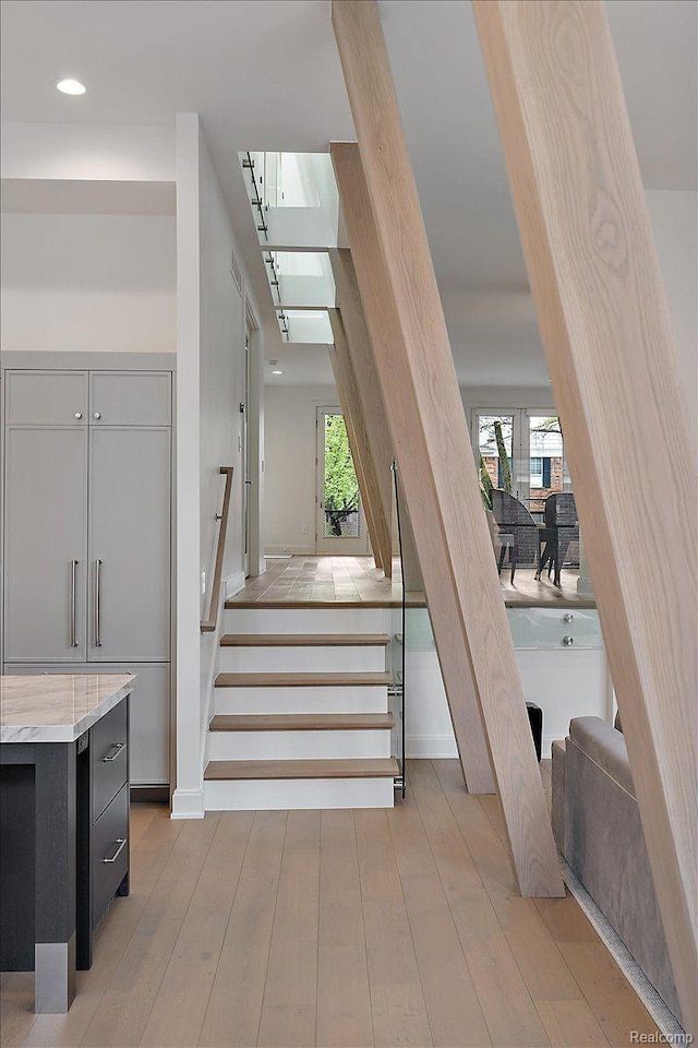 647 Ann St, Birmingham, MI 48009 - stairs featuring hardwood / wood-style flooring, healthy amount of natural light, and recessed lighting