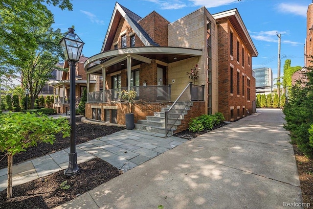 647 Ann St, Birmingham, MI 48009 - view of front of property featuring brick siding