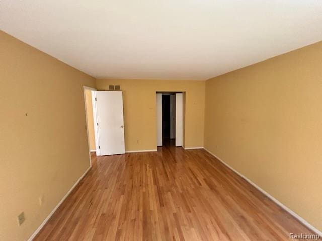 692 Brockmoor Ln, Bloomfield, MI 48304 - spare room with baseboards and light wood finished floors