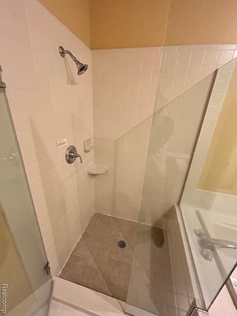 692 Brockmoor Ln, Bloomfield, MI 48304 - bathroom featuring a stall shower and tile patterned flooring
