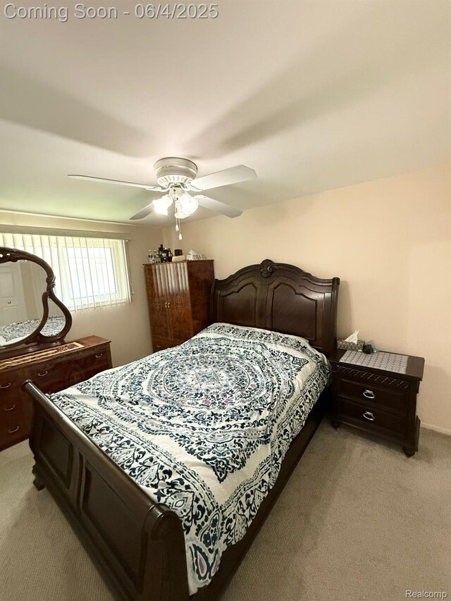 35677 Tina Dr, Warren, MI 48310 - bedroom with light carpet and a ceiling fan