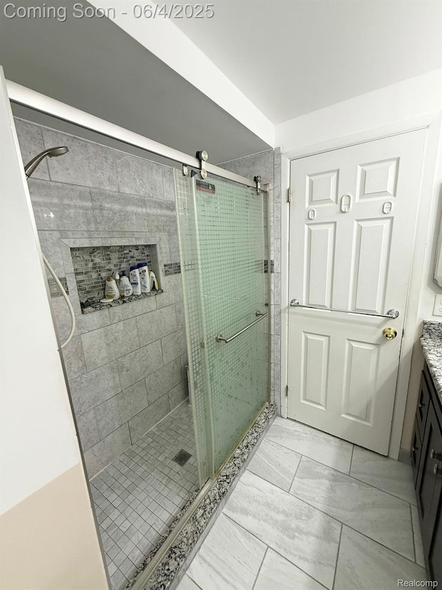 35677 Tina Dr, Warren, MI 48310 - full bathroom featuring a stall shower, vanity, and marble finish flooring
