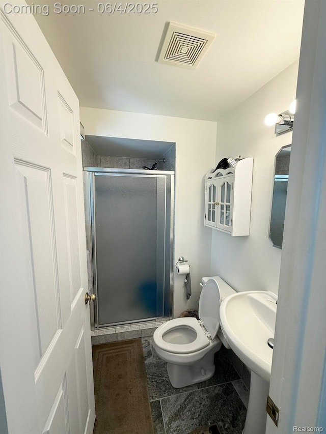 35677 Tina Dr, Warren, MI 48310 - full bathroom featuring a shower stall and toilet