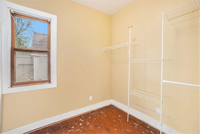828 Nagold St NW, Grand Rapids, MI 49504 - walk in closet featuring wood finished floors