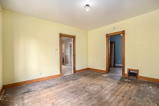 828 Nagold St NW, Grand Rapids, MI 49504 - spare room with hardwood / wood-style flooring and baseboards