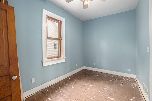 828 Nagold St NW, Grand Rapids, MI 49504 - spare room with a ceiling fan and baseboards