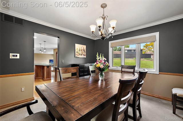 6730 Whiting Dr, Troy, MI 48098 - carpeted dining space with baseboards, a chandelier, and crown molding