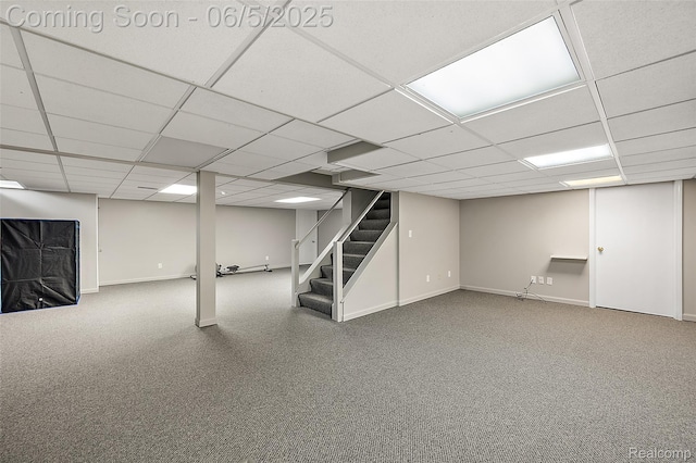 6730 Whiting Dr, Troy, MI 48098 - finished below grade area with stairway, a paneled ceiling, baseboards, and carpet flooring
