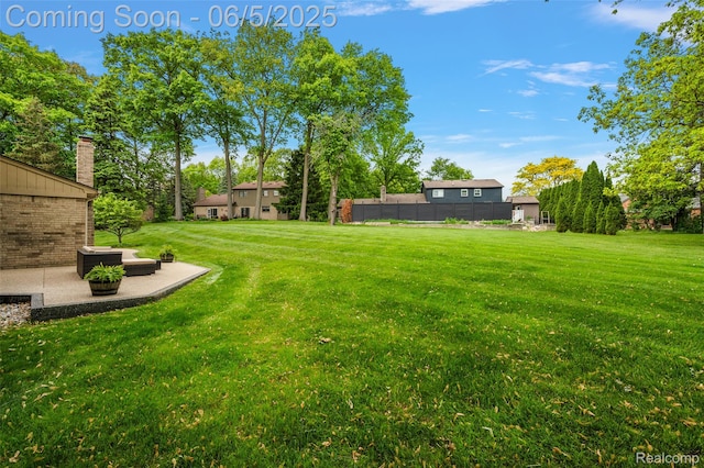 6730 Whiting Dr, Troy, MI 48098 - view of yard featuring a patio area