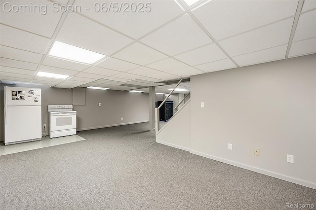 6730 Whiting Dr, Troy, MI 48098 - finished basement featuring freestanding refrigerator, baseboards, carpet floors, and a paneled ceiling