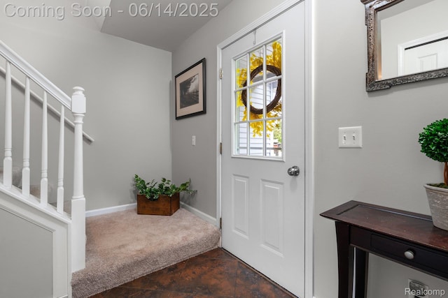9299 Appleview Ct, Brighton, MI 48116 - foyer with stairway and dark colored carpet