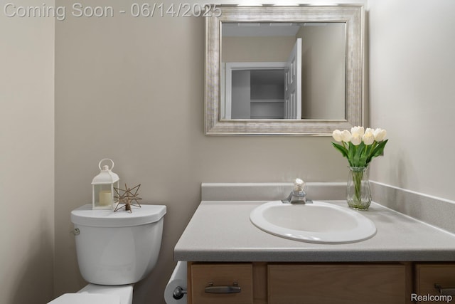 9299 Appleview Ct, Brighton, MI 48116 - half bathroom featuring toilet and vanity