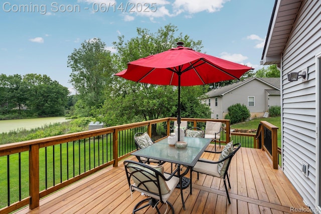9299 Appleview Ct, Brighton, MI 48116 - deck featuring outdoor dining area and a yard