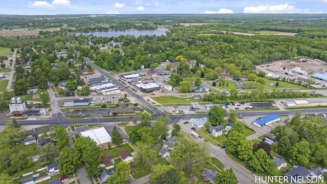 138 E Lake St, Sand Lake, MI 49343 - aerial overview of property's location featuring a forest and a large body of water