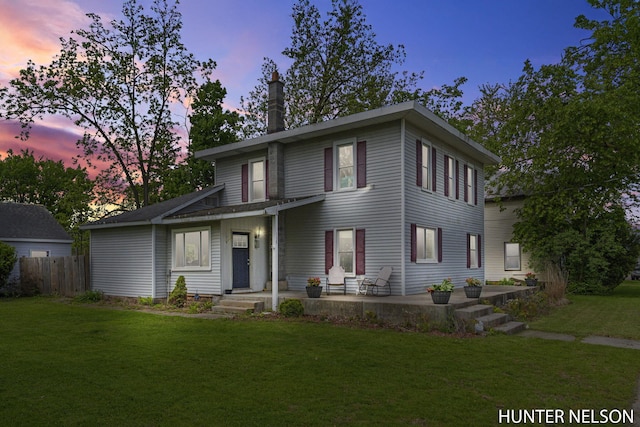 138 E Lake St, Sand Lake, MI 49343 - view of front facade with a chimney