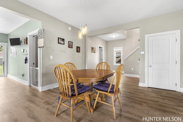 138 E Lake St, Sand Lake, MI 49343 - dining room featuring wood finished floors and baseboards