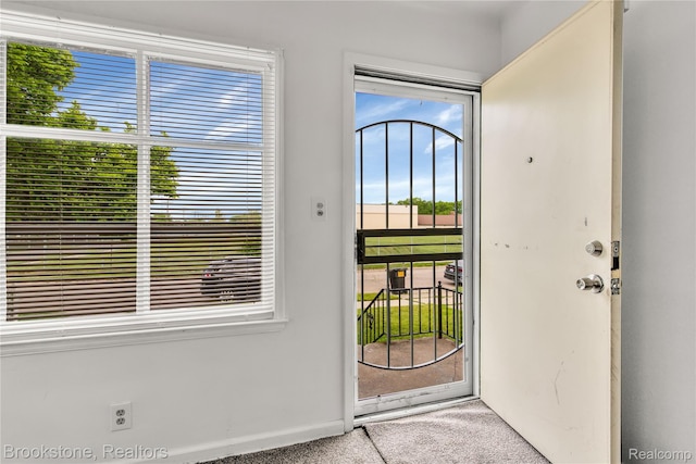 18410 Fenelon St, Detroit, MI 48234 - foyer entrance featuring carpet floors and baseboards