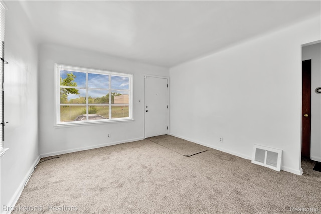 18410 Fenelon St, Detroit, MI 48234 - carpeted empty room featuring baseboards