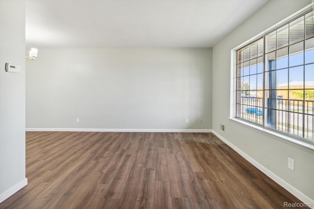 21121 Hayes Ave, Eastpointe, MI 48021 - empty room featuring dark wood finished floors and baseboards