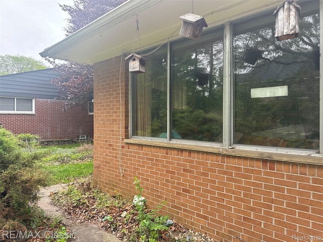 19332 Beverly Rd, Beverly Hills, MI 48025 - view of home's exterior with brick siding