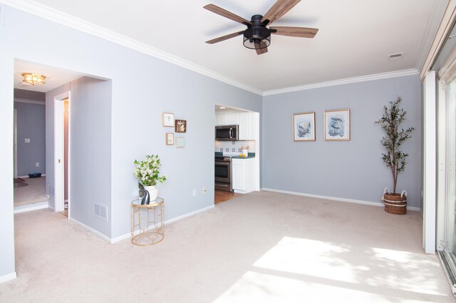 19578 Crystal Lake Dr, Northville, MI 48167 - unfurnished room featuring light colored carpet, ornamental molding, ceiling fan, and baseboards