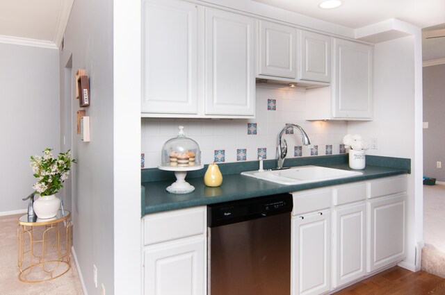 19578 Crystal Lake Dr, Northville, MI 48167 - kitchen featuring stainless steel dishwasher, a sink, ornamental molding, white cabinets, and dark countertops