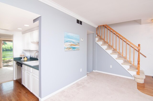 19578 Crystal Lake Dr, Northville, MI 48167 - stairway with baseboards, recessed lighting, crown molding, and wood finished floors