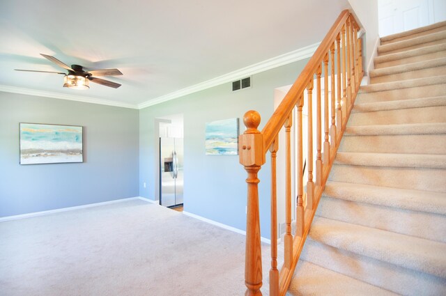 19578 Crystal Lake Dr, Northville, MI 48167 - stairway with crown molding, a ceiling fan, baseboards, and carpet