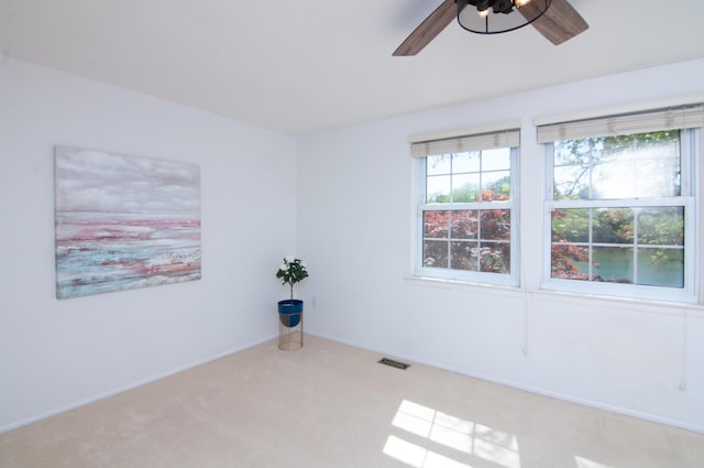 19578 Crystal Lake Dr, Northville, MI 48167 - empty room with ceiling fan, carpet, and baseboards