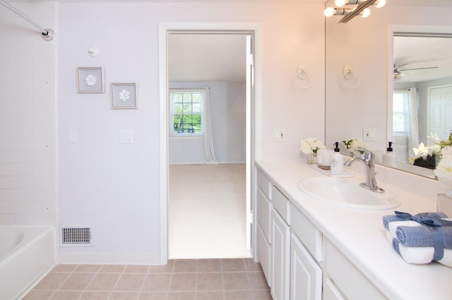 19578 Crystal Lake Dr, Northville, MI 48167 - full bath with vanity, a ceiling fan, shower / bathtub combination, and tile patterned floors