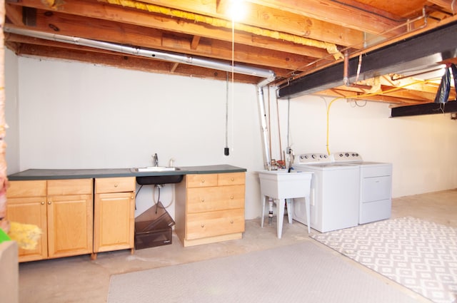 19578 Crystal Lake Dr, Northville, MI 48167 - unfinished below grade area featuring washing machine and dryer and a sink