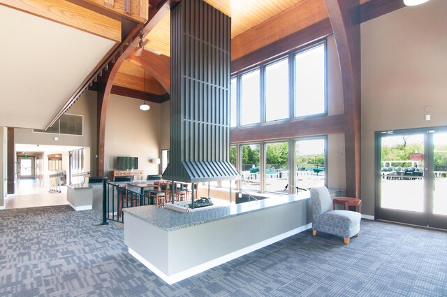 19578 Crystal Lake Dr, Northville, MI 48167 - community lobby featuring a towering ceiling and wooden ceiling