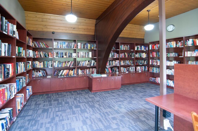 19578 Crystal Lake Dr, Northville, MI 48167 - carpeted office with bookshelves and wooden ceiling