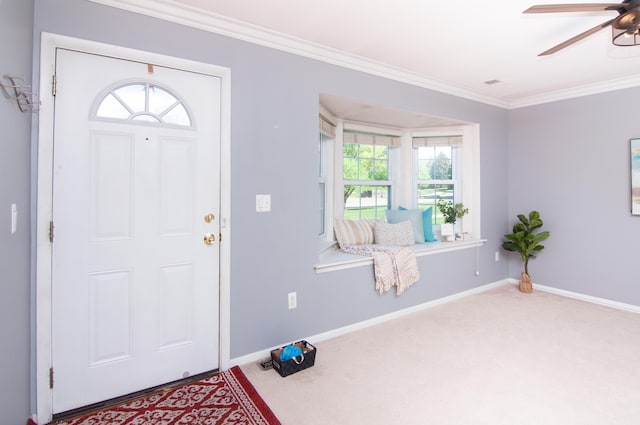 19578 Crystal Lake Dr, Northville, MI 48167 - carpeted entrance foyer with a ceiling fan, crown molding, and baseboards