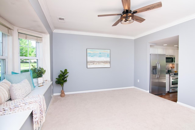19578 Crystal Lake Dr, Northville, MI 48167 - sitting room with carpet, a ceiling fan, baseboards, and crown molding