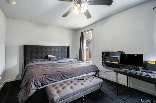 236 Helmar Ct, Benton Harbor, MI 49022 - carpeted bedroom with baseboards and a ceiling fan