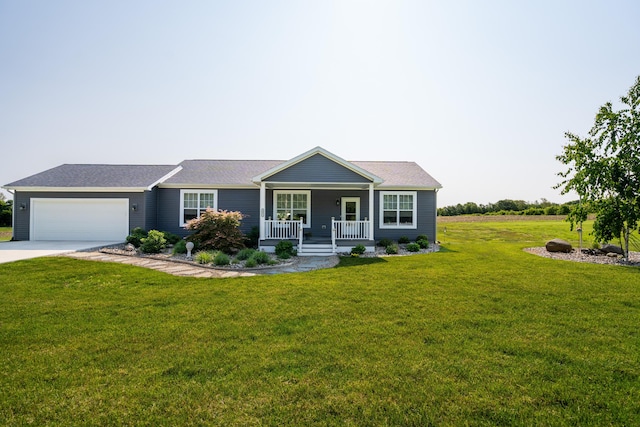 30877 County Road 687, Bangor, MI 49013 - ranch-style home featuring covered porch, an attached garage, a front yard, and driveway
